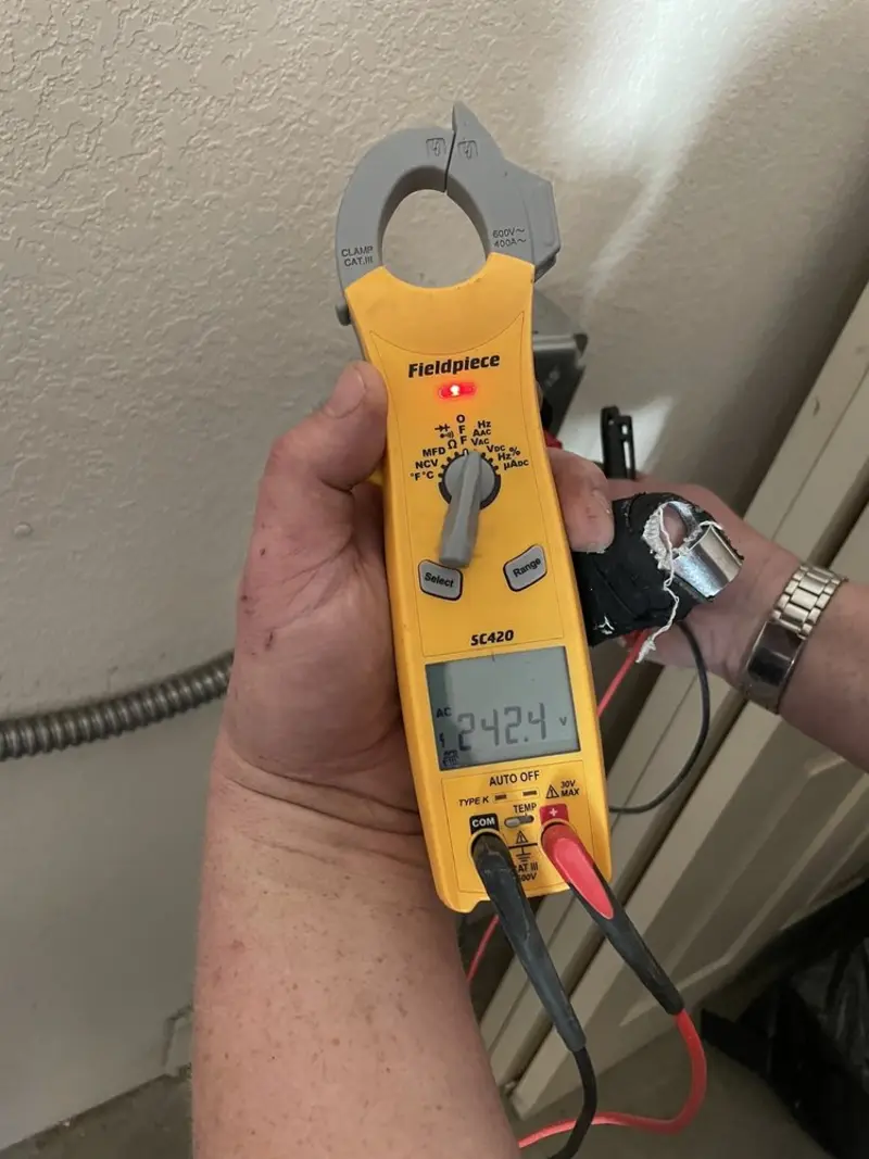 Voltage testing with clamp meter during Ceiling Fan Installation in Parkesburg
